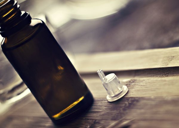 Pull the cap out of your essential oil bottle for easier pouring